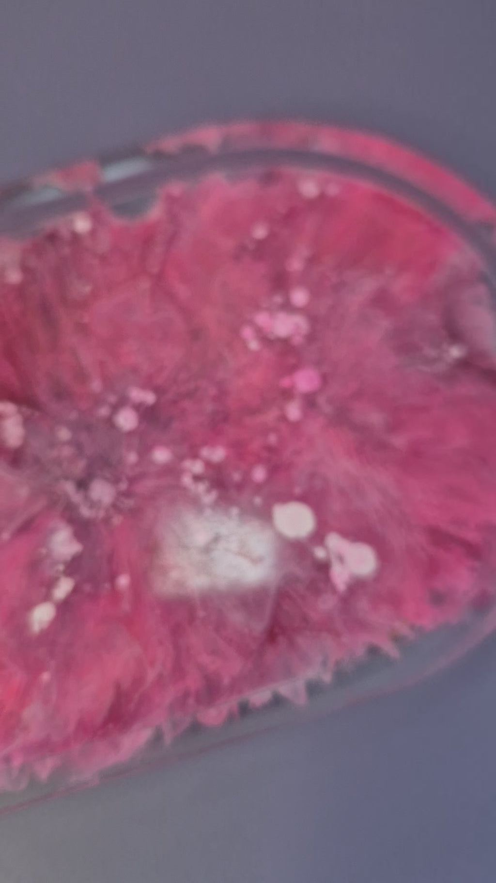 video of handmade resin trinket tray showing the petri dish effect and layered detail