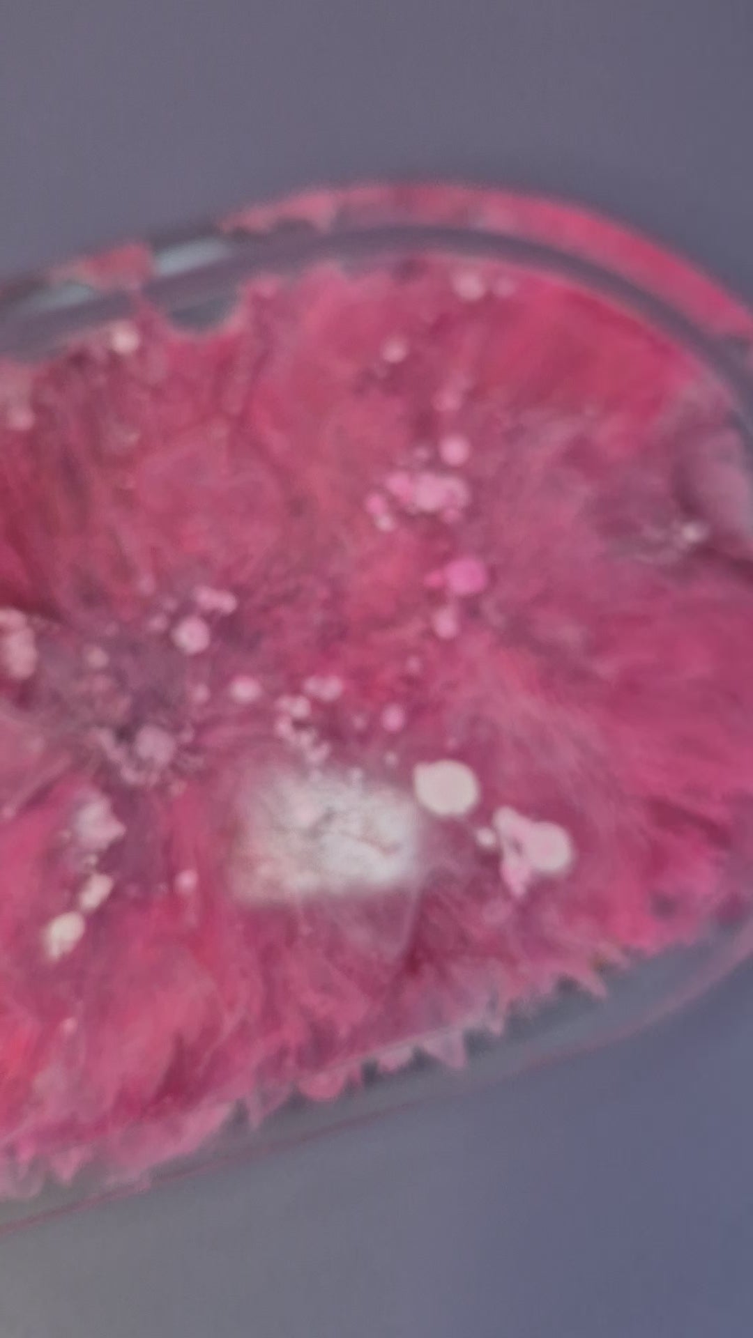 video of handmade resin trinket tray showing the petri dish effect and layered detail